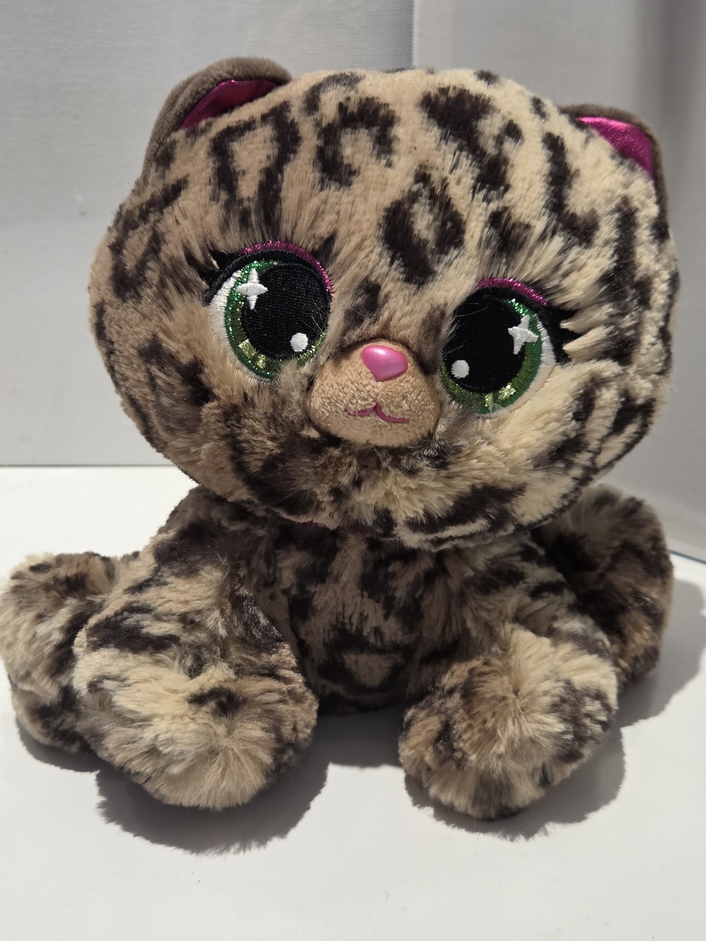 Lush Leopard-Print Plush with Gold Brand Tag